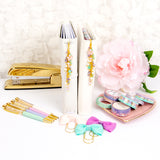 Pink Pearl Pastel Dangle Charms shown on planners