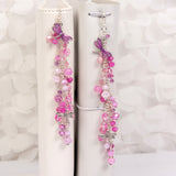 Pink Dragonfly Dangle Charm shown on planners