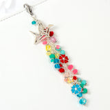 Paper Crane charm with enamel flower charms and a crystal dangle