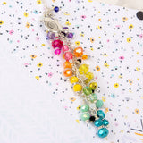 New Chapter Bird Charm with Rainbow Dangle