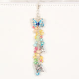 April Meadow Planner Charm with pastel rainbow crystals and butterfly, bunny and dog charms