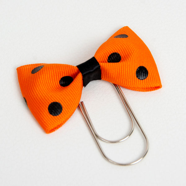 Orange and black dot bow planner clip with silver wide paper clip