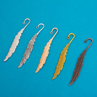 Feather bookmark charms in silver, antique silver, rose gold, antique gold and antique copper