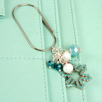 Aqua enamel snowflake wide dangle clip with aqua, teal, white and red crystals
