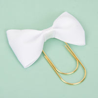 White grosgrain bow paperclip in gold
