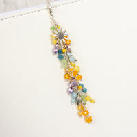 Sunflower Planner Charm with golden, yellow, blue, green and purple crystals