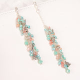 Sewing themed charms with aqua and peach crystal dangle